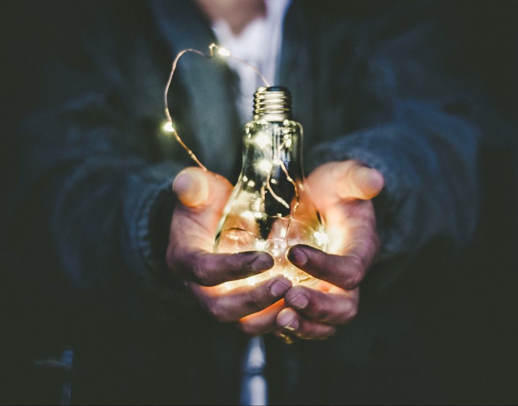 Man holding lightbulb