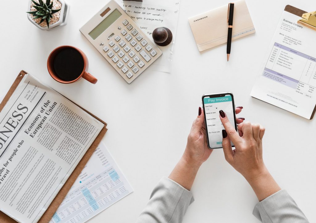 Busy desk with business person