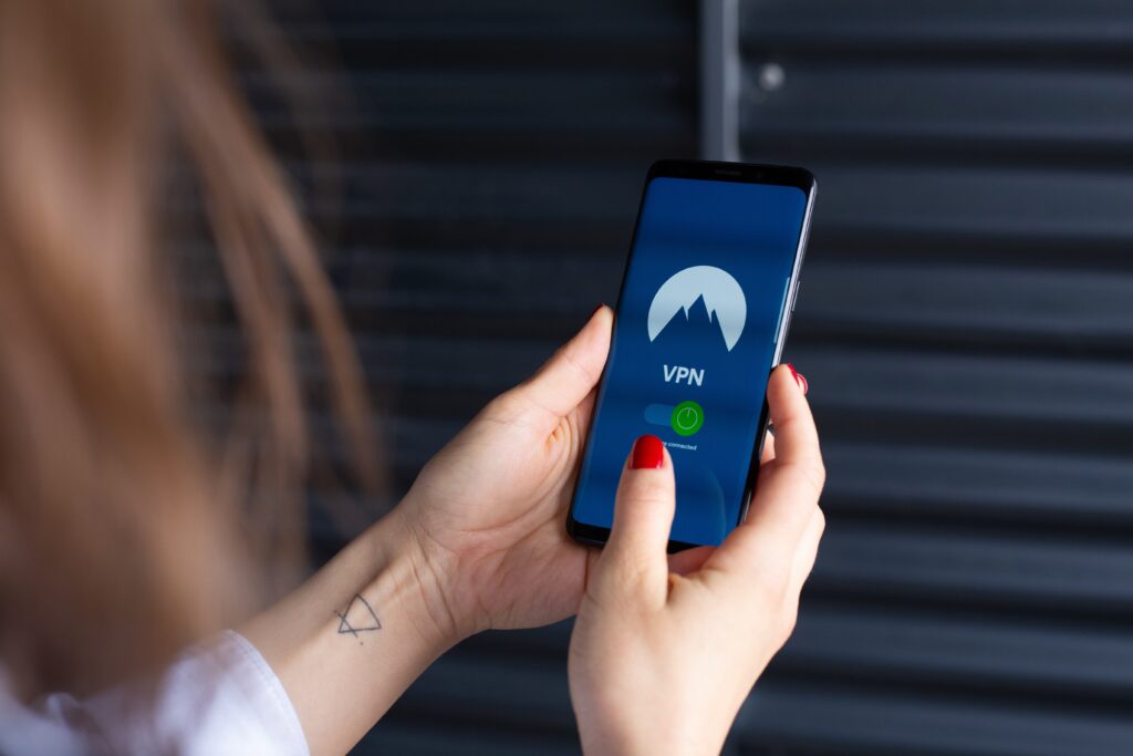 ICO for e-commerce - woman turning on VPN on her phone